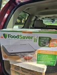 Foodsaver FM2110 Electric Vacuum Sealer Silver W/ Bags, Roll, Drip Tray. Fixed Price $75.00.