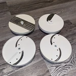 Oster Regency Controlled Power Kitchen Center 971-04B Parts: Cutting Discs. Fixed Price $15.00.