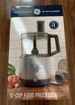 Ge 12 Cup Food Processor Stainless Steel Specialty Shredder Blades. Fixed Price $50.00.