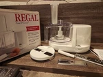 Regal Model K7755 Food Processor With All Parts. Kept In Box, Looks Unused. Fixed Price $75.00.