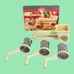 Vintage 1984 Cooks Tools 2 Triple Grater With 3 Drums & Original Box. Fixed Price $18.00.