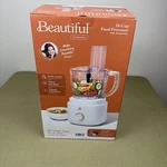 New* Beautiful 10-CUP Food Processor With Accessories, By Drew Barrymore. Fixed Price $49.99.