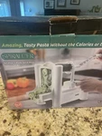 Spiralizer Five Blade Vegetable Slicer With Attachments. Fixed Price $12.00.