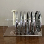 Acrylic 6 Holder With Cuisinart Blades And Mount. Fixed Price $25.00.