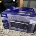 Oster Household Microwave Oven - Stainless Steel 700 Watt 0.7 Cu. Ft. Excellent. Fixed Price $60.00.