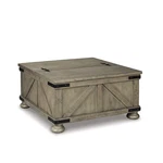Signature Design By Ashley Casual Aldwin Coffee Table With Storage Gray. Fixed Price $509.60.