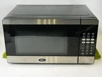 Oster Household Microwave Oven - Stainless Steel 700 Watt 0.7 Cu. Ft. Excellent. Fixed Price $48.85.