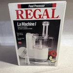 New Vintage Regal La Machine Food Processor White Model K813GY Unopened. Fixed Price $99.00.