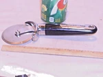 New 3" Inch Pro Stainless Steel Pizza Wheel Cutter. Fixed Price $16.99.