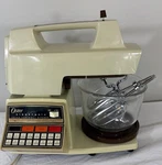 Vintage Oster Kitchen Center 16-SPEED Base, 978-08H, With Attachments Bowl. Fixed Price $99.95.