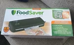 Foodsaver Vacuum Sealer FM2000-000. Kit Includes. Fixed Price $84.00.